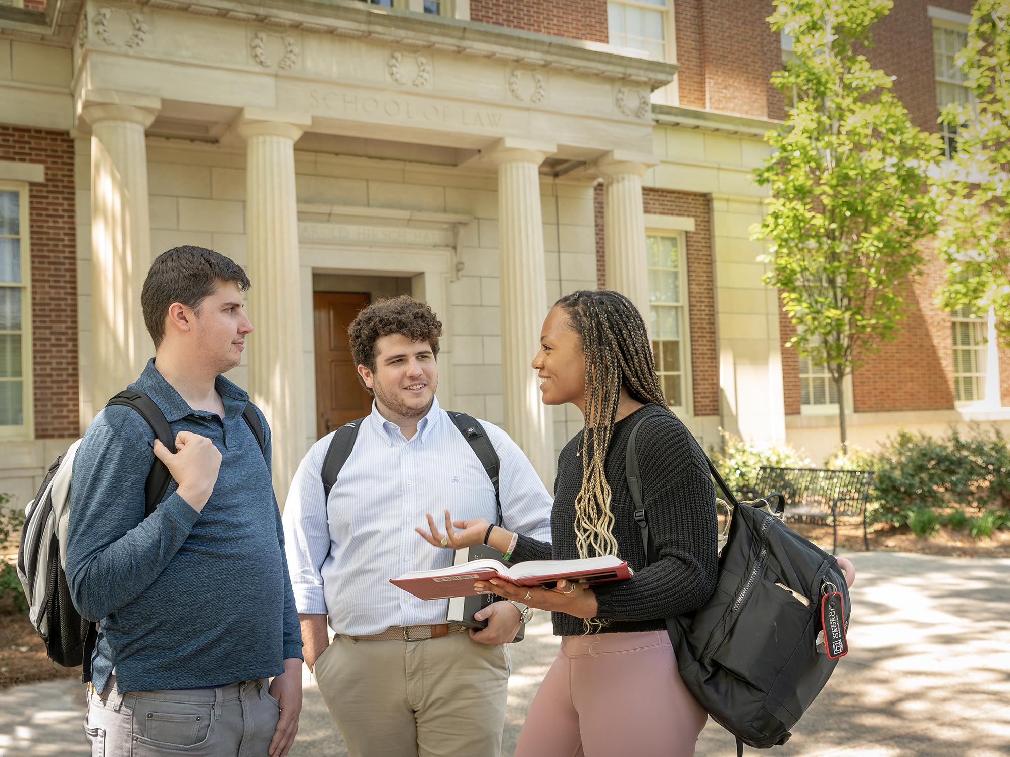 students in front of main entrance