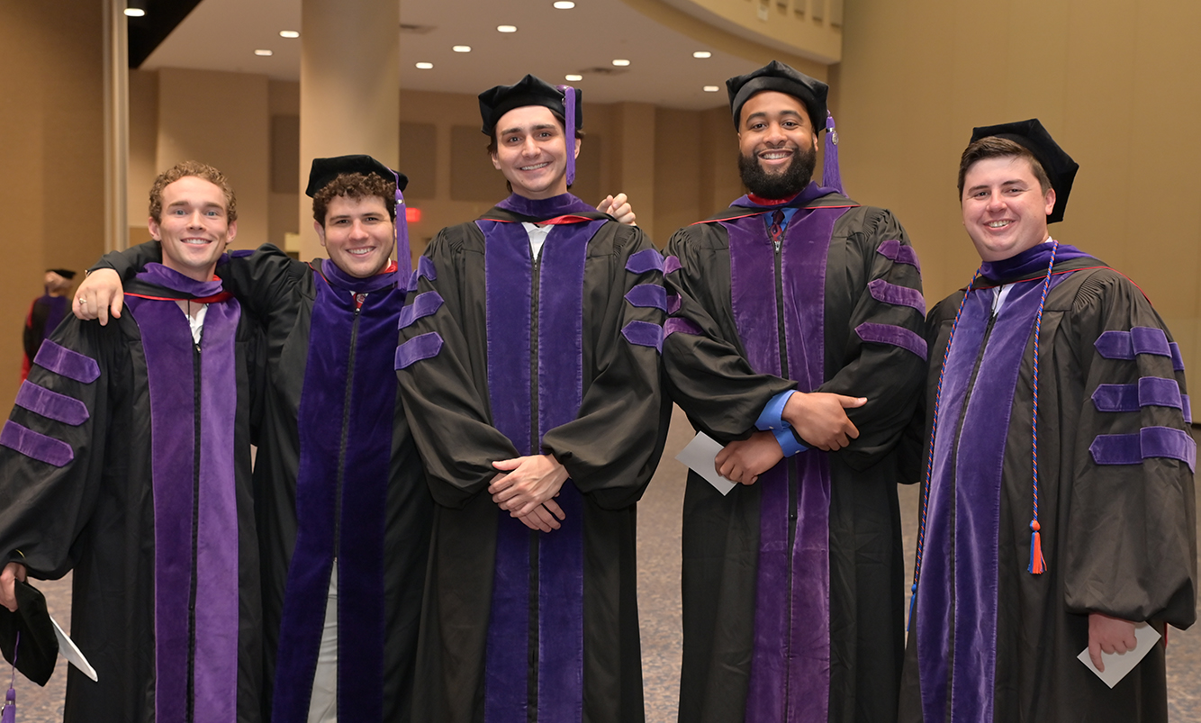 Graduates (l. to r.) Jack Cofer, Tanner Samples, Armon Abedi, Michael Devlin and Brennan Rose pose together before the ceremony. Photo by Dennis McDaniel. 